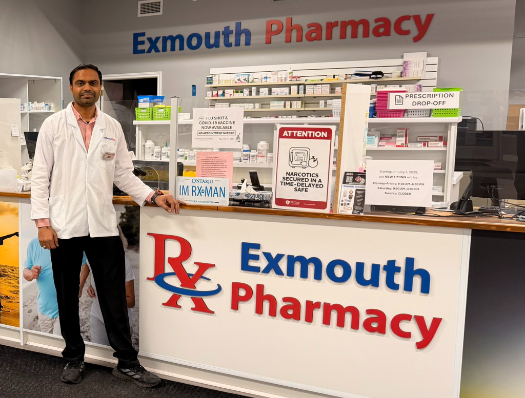Vishal at the Exmouth Pharmacy prescription counter.